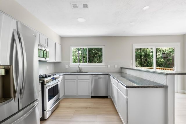 2108 W Lacey Oak Circle, The Woodlands, TX 77380