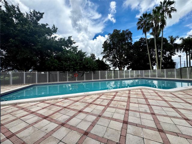 7165 NW 186th Street A211, Hialeah, FL 33015