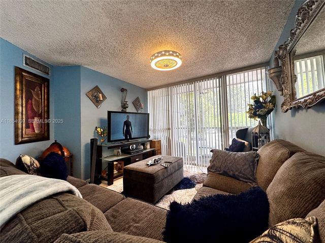 7165 NW 186th Street A211, Hialeah, FL 33015