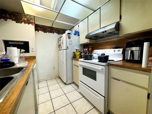7165 NW 186th Street A211, Hialeah, FL 33015