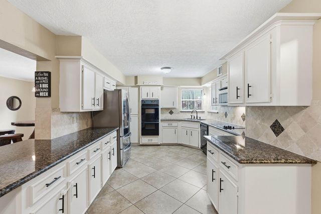 6303 Moccasin Bend Drive, Spring, TX 77379