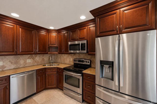 61 Hemlock Lane, Massapequa Park, NY 11762
