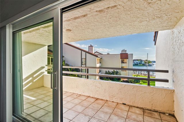 126 S 1ST STREET E 102, Tierra Verde, FL 33715
