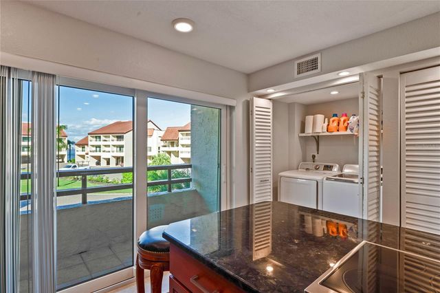 126 S 1ST STREET E 102, Tierra Verde, FL 33715