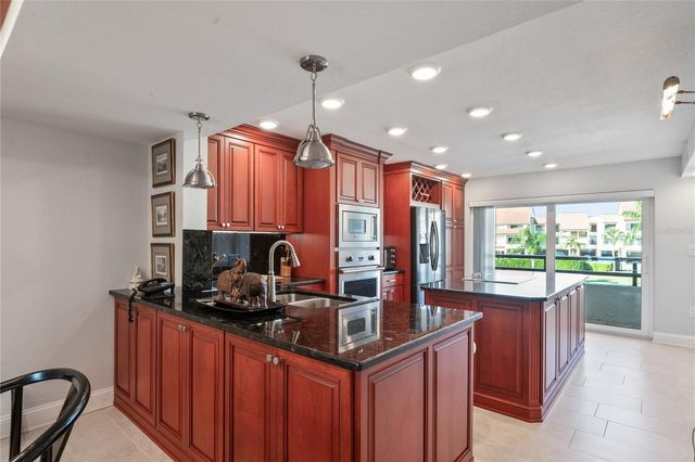 126 S 1ST STREET E 102, Tierra Verde, FL 33715
