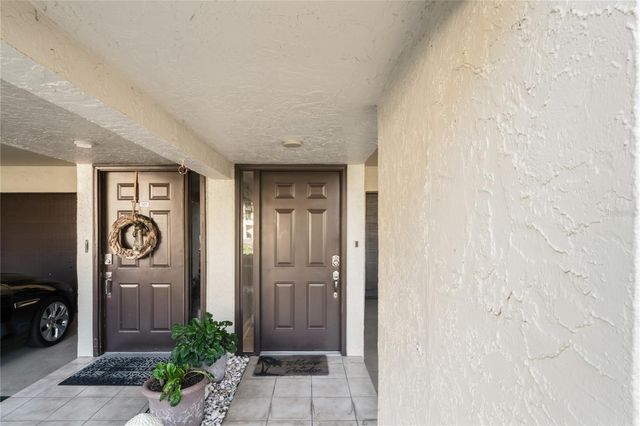 126 S 1ST STREET E 102, Tierra Verde, FL 33715