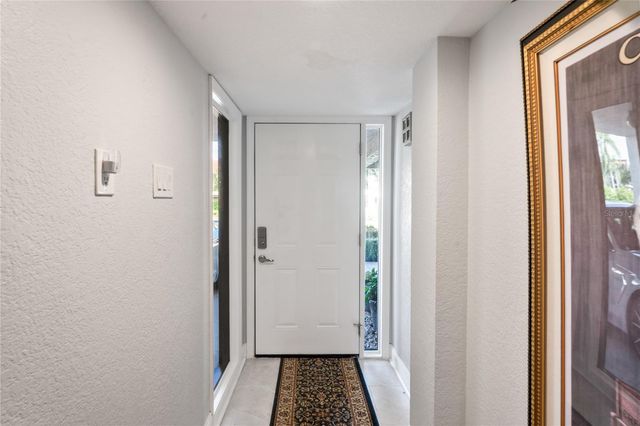 126 S 1ST STREET E 102, Tierra Verde, FL 33715