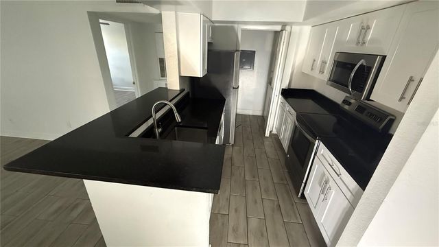 5587 DEVONBRIAR WAY J104, Orlando, FL 32822