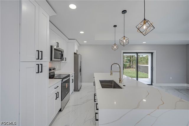 1207 Galileo ST E, Lehigh Acres, FL 33974