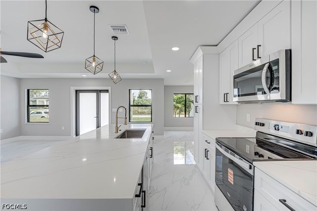 1207 Galileo ST E, Lehigh Acres, FL 33974
