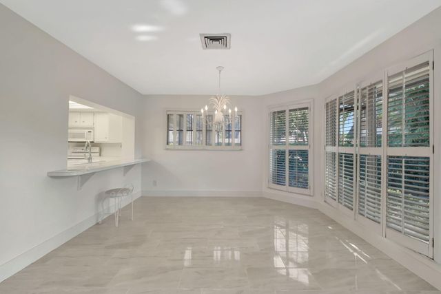 428 Pine Villa Drive, Atlantis, FL 33462