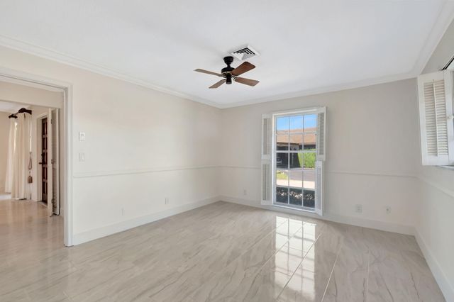 428 Pine Villa Drive, Atlantis, FL 33462