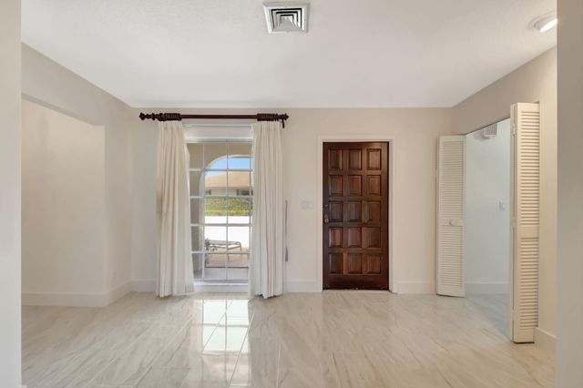 428 Pine Villa Drive, Atlantis, FL 33462