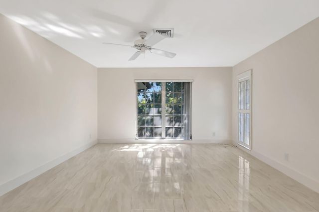 428 Pine Villa Drive, Atlantis, FL 33462