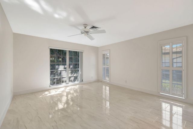 428 Pine Villa Drive, Atlantis, FL 33462