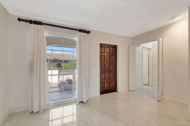 428 Pine Villa Drive, Atlantis, FL 33462