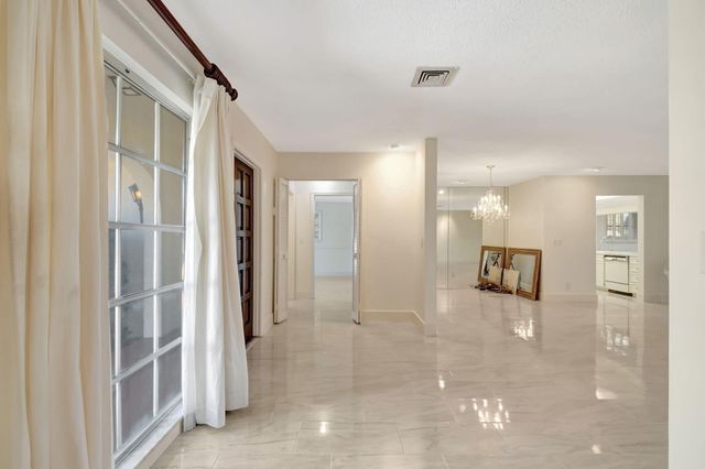 428 Pine Villa Drive, Atlantis, FL 33462