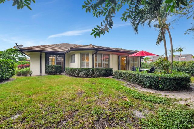 428 Pine Villa Drive, Atlantis, FL 33462