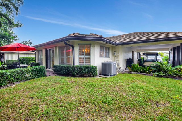 428 Pine Villa Drive, Atlantis, FL 33462