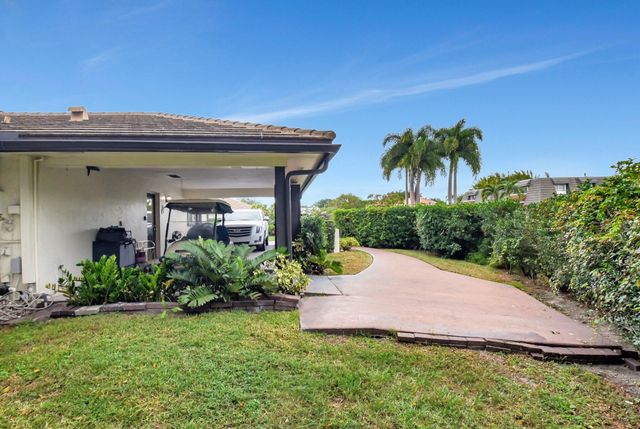 428 Pine Villa Drive, Atlantis, FL 33462