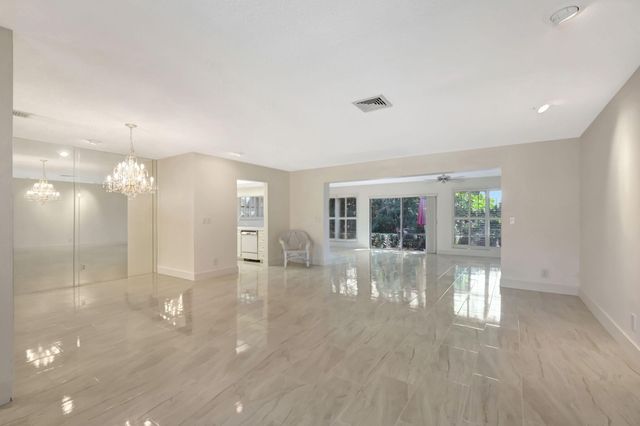 428 Pine Villa Drive, Atlantis, FL 33462
