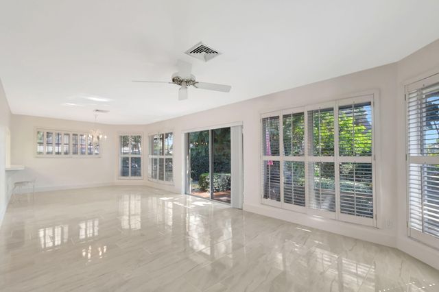 428 Pine Villa Drive, Atlantis, FL 33462