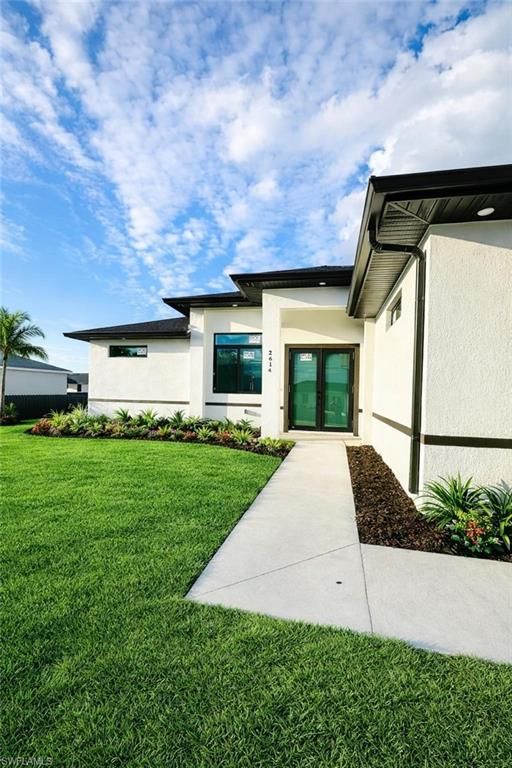 2614 12th ST SW, LEHIGH ACRES, FL 33976 — photo 2