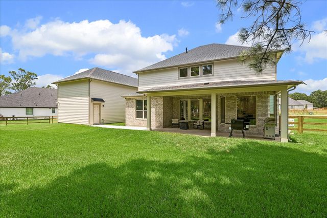 615 Running Iron Lane, Magnolia, TX 77354
