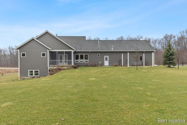 5555 Cannon Meadows Drive NE, Ada, MI 49301