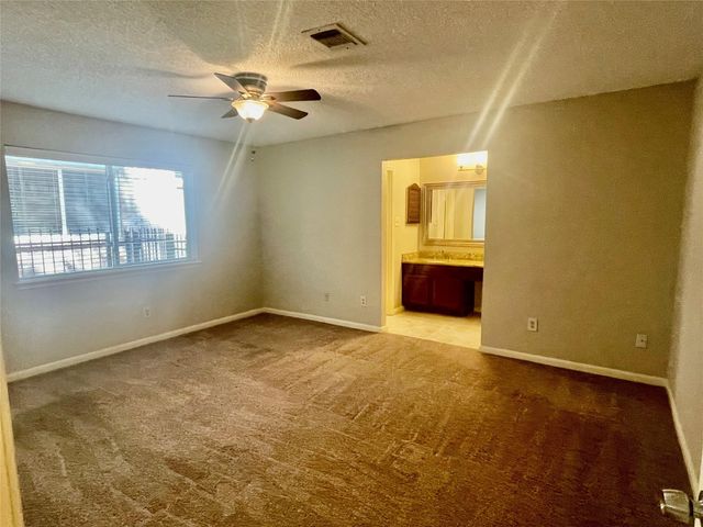 13 Maywind Court, The Woodlands, TX 77381