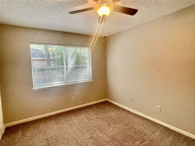 13 Maywind Court, The Woodlands, TX 77381