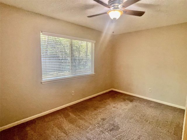13 Maywind Court, The Woodlands, TX 77381