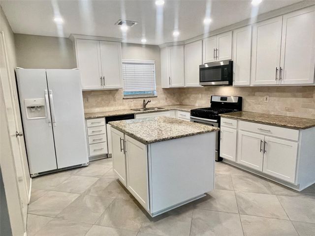 13 Maywind Court, The Woodlands, TX 77381