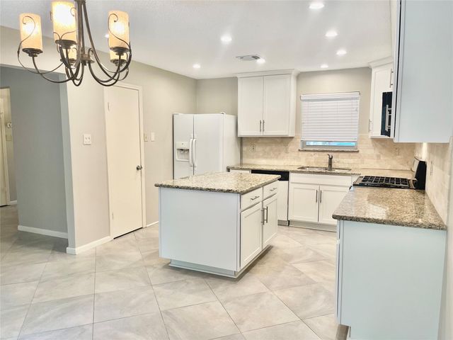 13 Maywind Court, The Woodlands, TX 77381