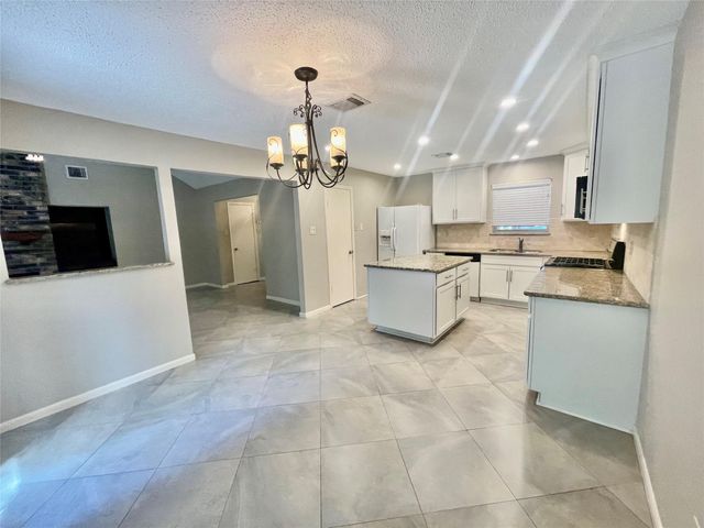 13 Maywind Court, The Woodlands, TX 77381