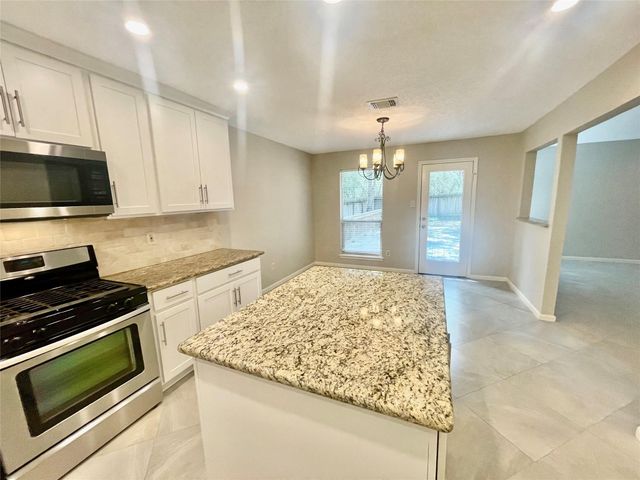 13 Maywind Court, The Woodlands, TX 77381