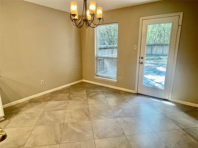 13 Maywind Court, The Woodlands, TX 77381