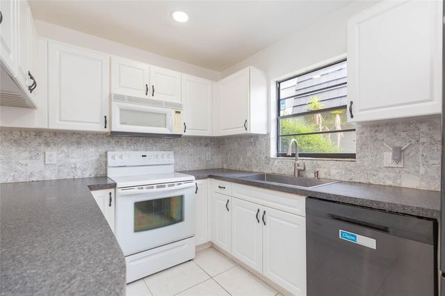 12738 WOOD TRAIL BOULEVARD, Tampa, FL 33625