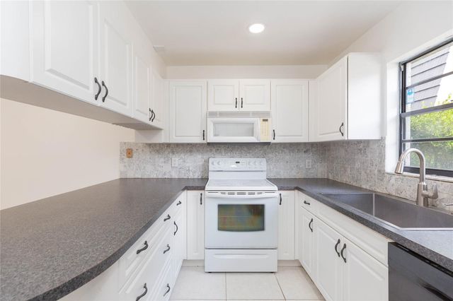 12738 WOOD TRAIL BOULEVARD, Tampa, FL 33625