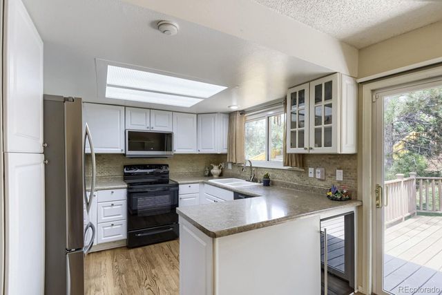 9062 Woodland Drive, Littleton, CO 80126