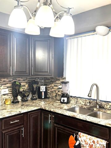 14241 S Marquette Avenue, Burnham, IL 60633