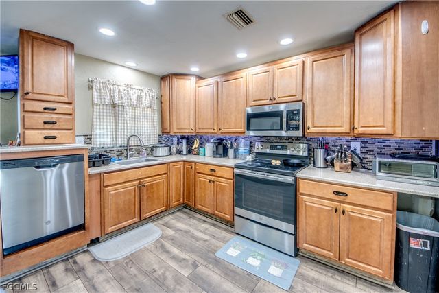 3015 8th ST SW, Lehigh Acres, FL 33976