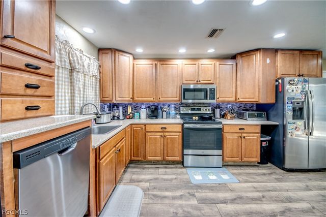 3015 8th ST SW, Lehigh Acres, FL 33976