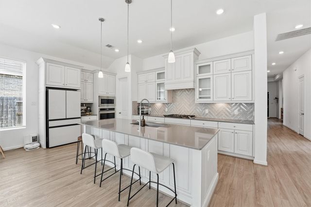 6071 Windward Falls Way, Kingwood, TX 77365