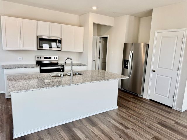 12815 Village Spun PLZ, Buda, TX 78610