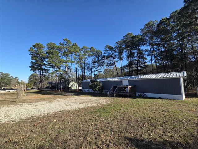 11224 Creek Meadow Dr, Willis, TX 77378