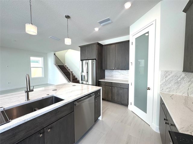 9819 GOBAT ALLEY, Orlando, FL 32827