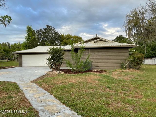 125 TWIN LAKE GROVE Drive, Interlachen, FL 32148