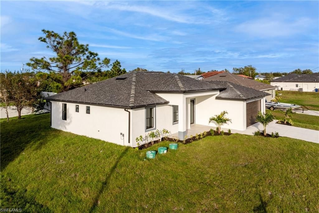 3318 9th ST SW, LEHIGH ACRES, FL 33976 — photo 2