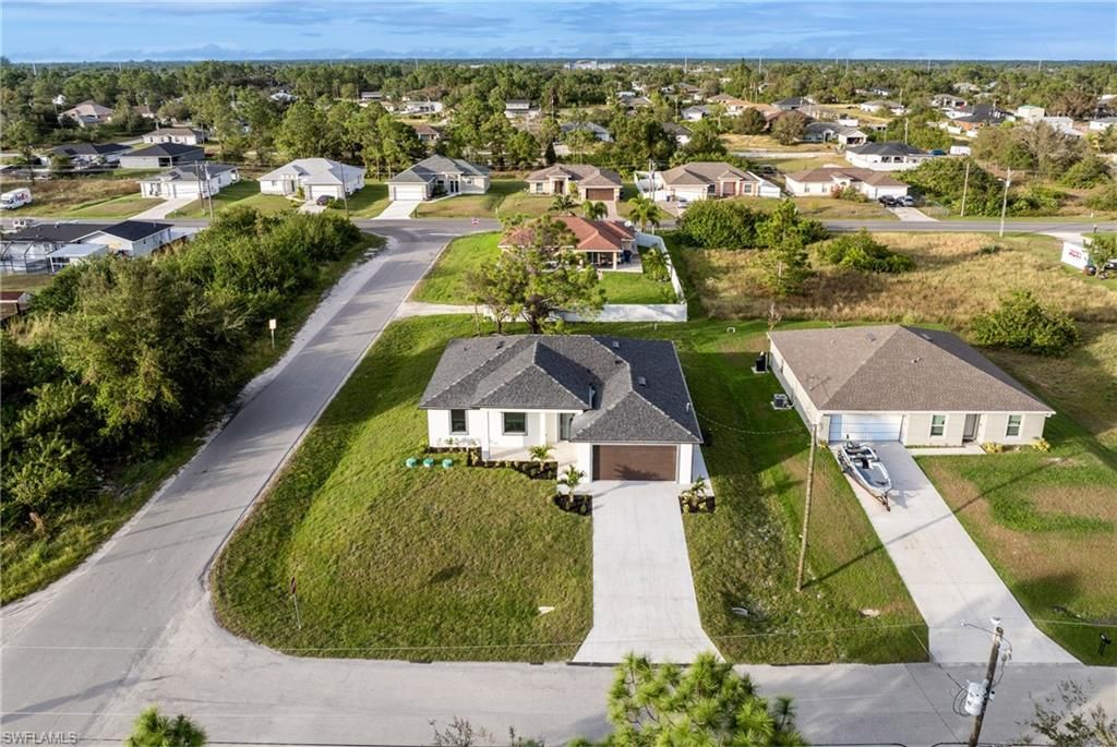 3318 9th ST SW, LEHIGH ACRES, FL 33976 — photo 4